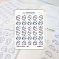 Scripted Hours "Coffee Lover" sticker sheet featuring multiple cute white ghost characters holding pastel blue, purple, and brown coffee cups with various happy or sleepy expressions and red hearts, laid upon a planner page showing "Pilates class" written in ink