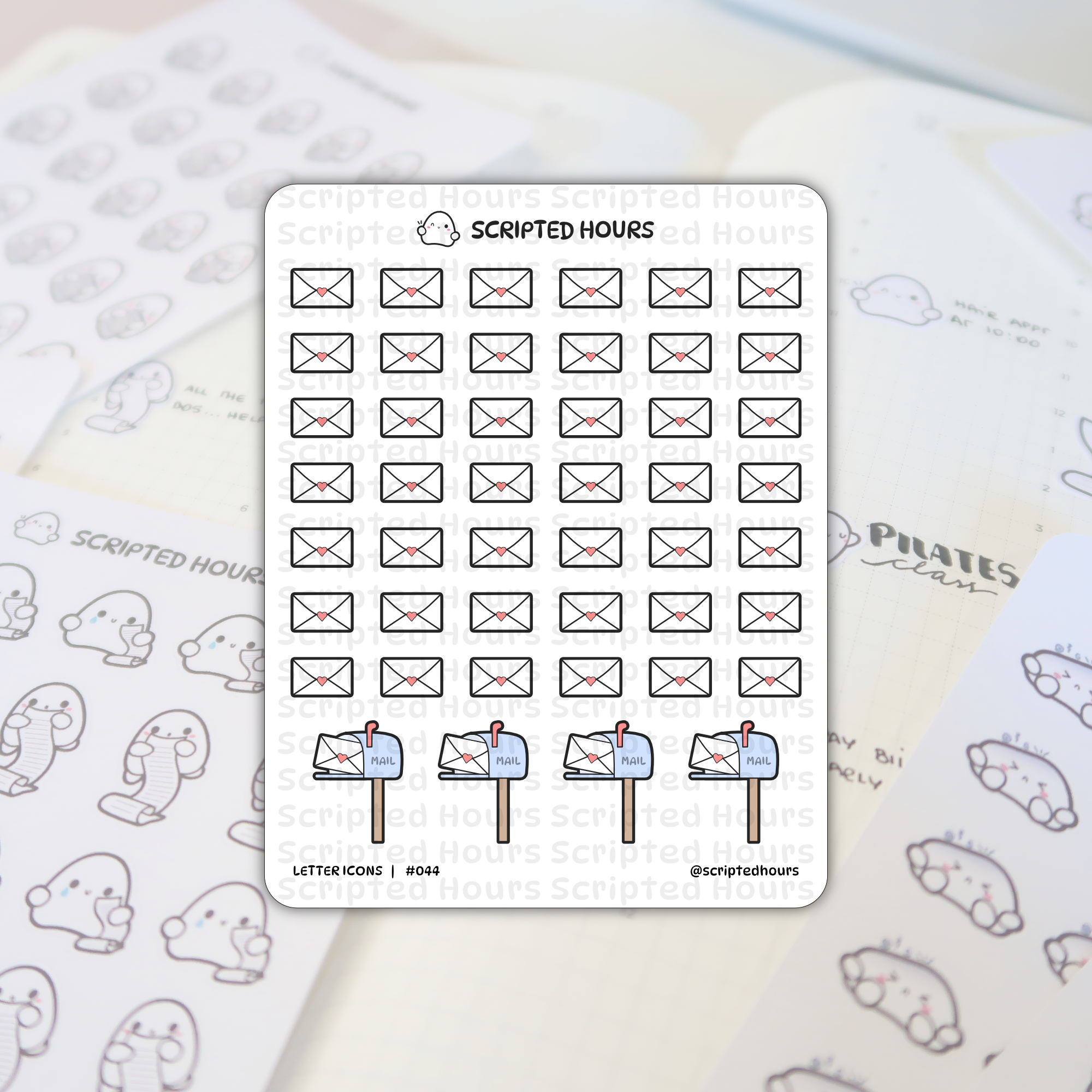 Scripted Hours sticker sheet featuring dozens of tiny black outline envelopes with pink hearts and a bottom row of blue mailboxes with "MAIL" flags displayed on an open white planner with ghost-like stickers and gray "Pilates class" text
