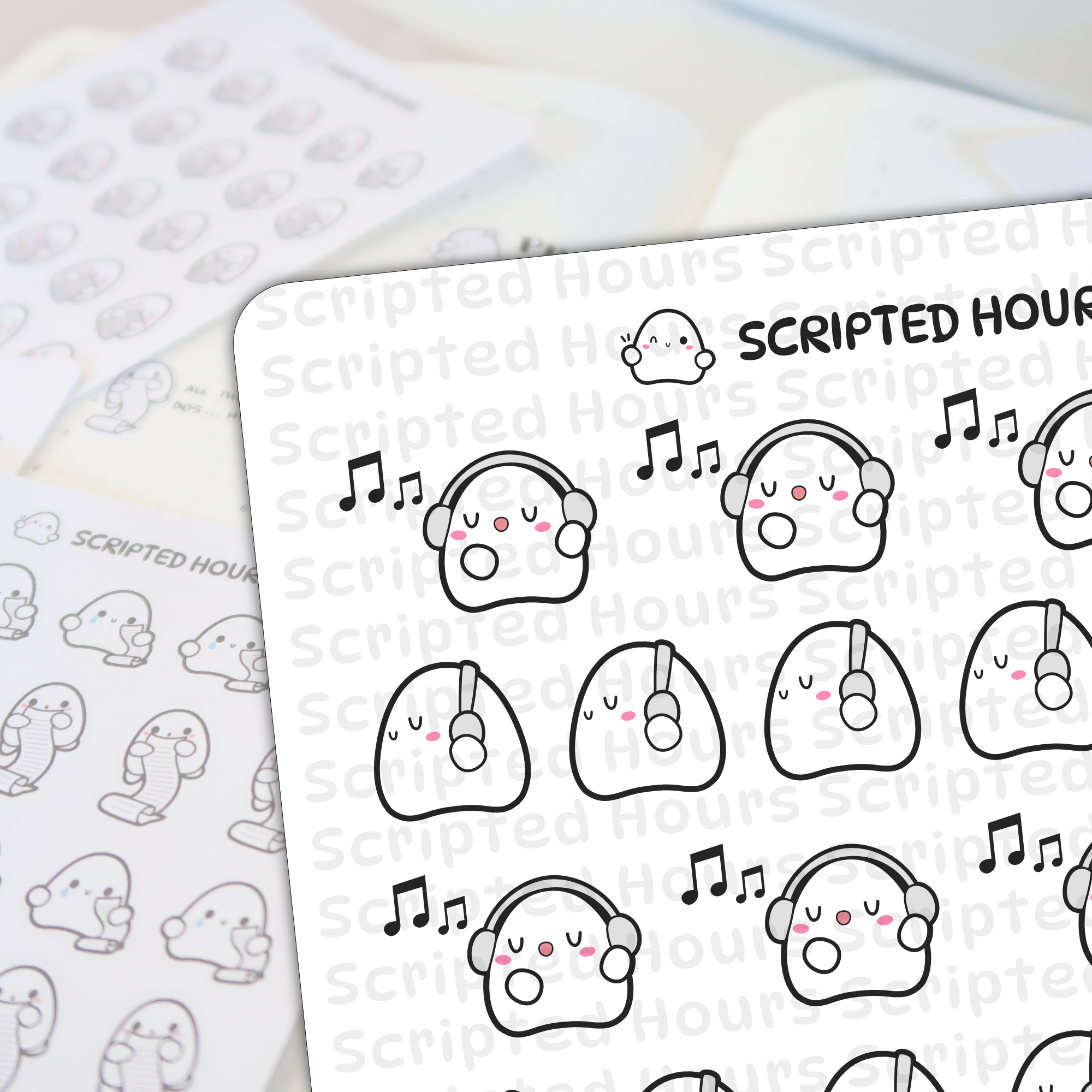 Scripted Hours die-cut sticker sheets featuring adorable white ghost characters with pink cheeks wearing grey headphones and black music notes indicating singing