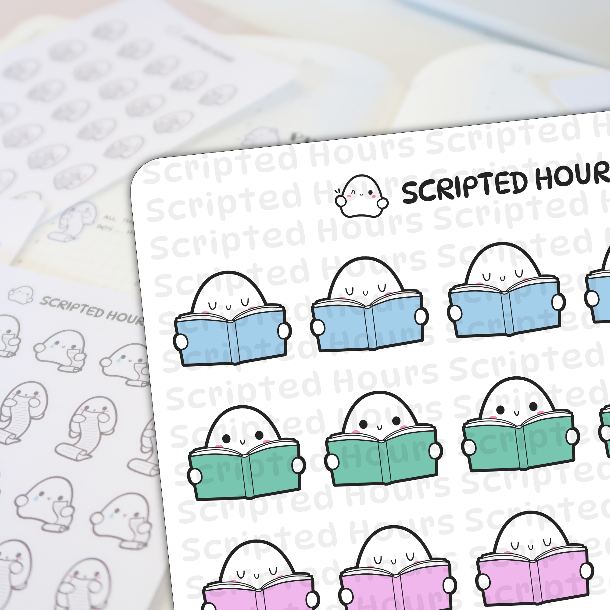 Scripted Hours digital stickers depict cute white ghost characters with U-shaped eyes and pink blush happily reading open books in pastel blue, mint green, and pink, on a sheet with a blurry background of similar ghost-themed designs including characters holding scrolls
