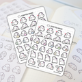 Scripted Hours sticker sheets of Mom Life Sampler #063 planner stickers depicting adorable white ghost characters with pink bows interacting with baby ghosts, many holding colorful pastel mugs or expressing 'WAAAH' with a 'HELP' speech bubble, shown on an open planner