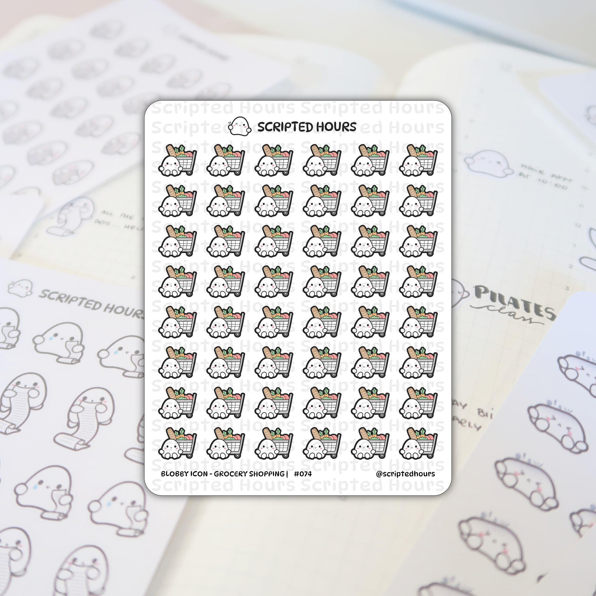 Scripted Hours sticker sheet featuring Blobby Icon - Grocery Shopping planner stickers showing cute white blob characters pushing carts filled with green lettuce, orange carrots, and a brown baguette, resting on an open planner displaying other Scripted Hours icons and 'PILATES class' text