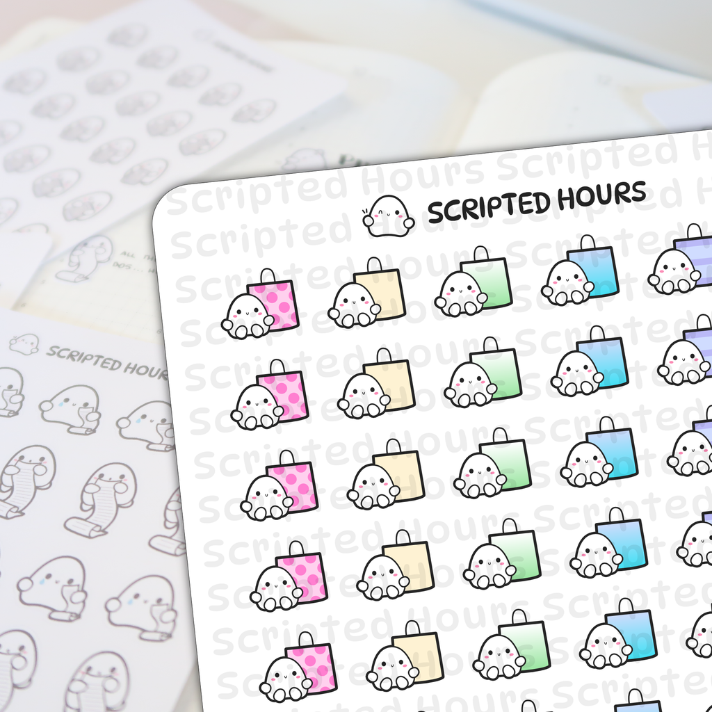 Die-cut vinyl stickers by Scripted Hours featuring cute white ghost characters on planner sheets with colorful shopping bags in pink polka dot beige green and blue and other ghosts holding scrolls
