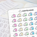 Die-cut vinyl stickers by Scripted Hours featuring cute white ghost characters on planner sheets with colorful shopping bags in pink polka dot beige green and blue and other ghosts holding scrolls