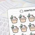 Digital illustration stickers by Scripted Hours depicting cheerful white succulent characters with pink blush and small pink flowers on their heads, nestled in pale beige pots with green leaves, on a desk with other blurred ghost-shaped planner stickers