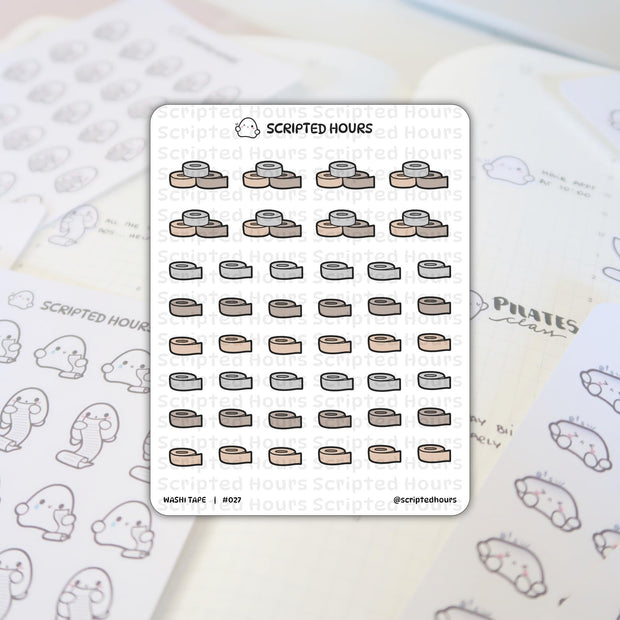 Photograph of Scripted Hours Washi Tape #027 sticker sheet displaying 42 neutral grey beige and light brown tape rolls, set on a planner page alongside other Scripted Hours ghost character and 'PILATES class' text stickers