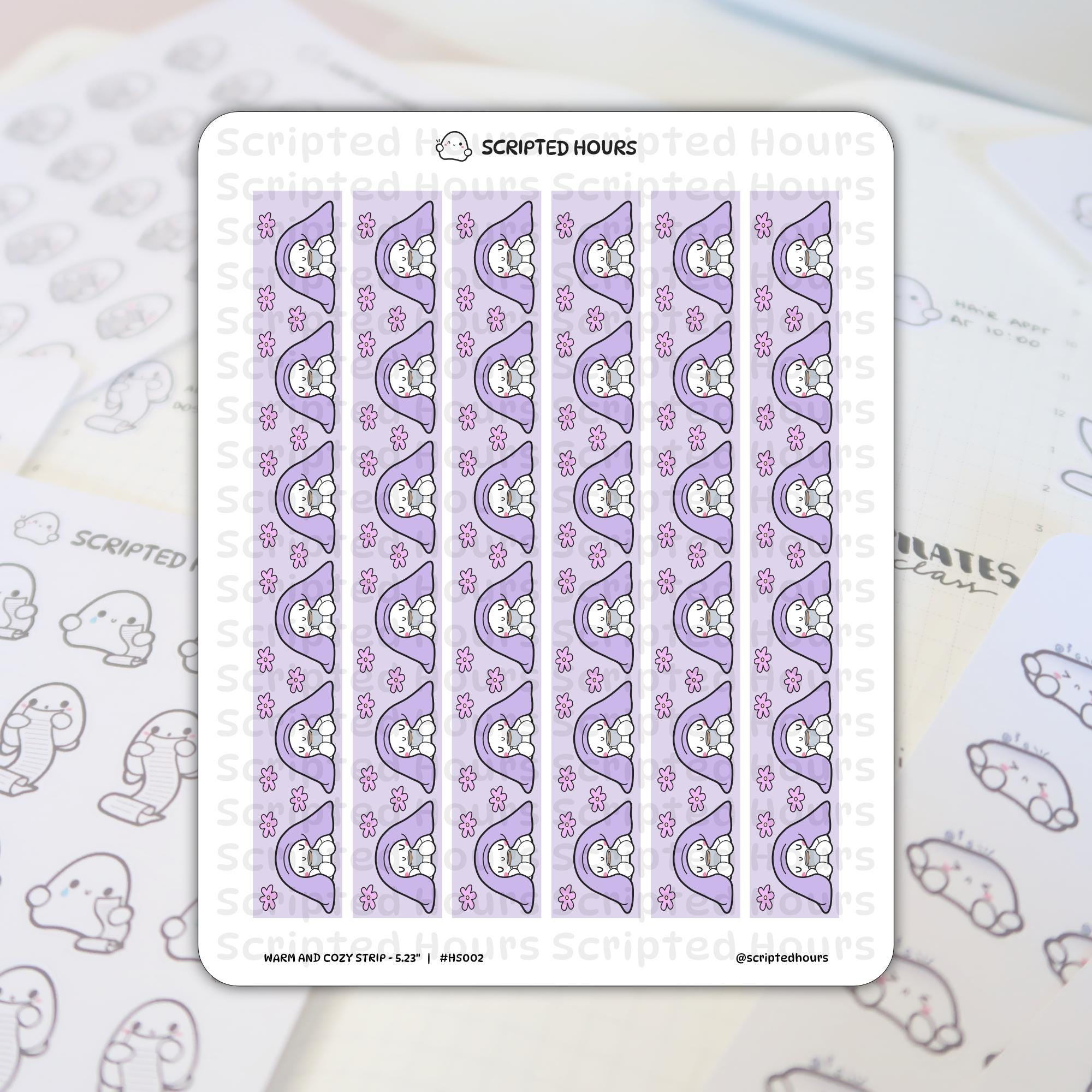 Scripted Hours planner sticker sheet 'Warm and Cozy Strip - 5.23' featuring continuous rows of charming white ghost characters wearing lavender hooded cloaks and holding coffee mugs, amidst small pink flowers on a striped purple background, with other Scripted Hours outline stickers softly visible