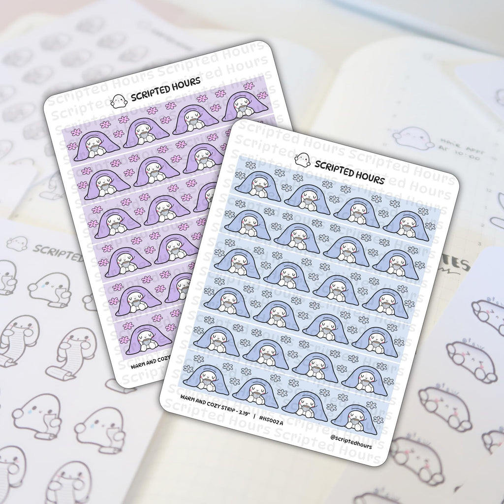 Sticker illustration by Scripted Hours featuring two 'Warm and Cozy' sticker sheets with white ghost characters holding mugs under purple blankets with pink flowers and blue blankets with blue flowers, displayed on a planner page next to outline ghost stickers