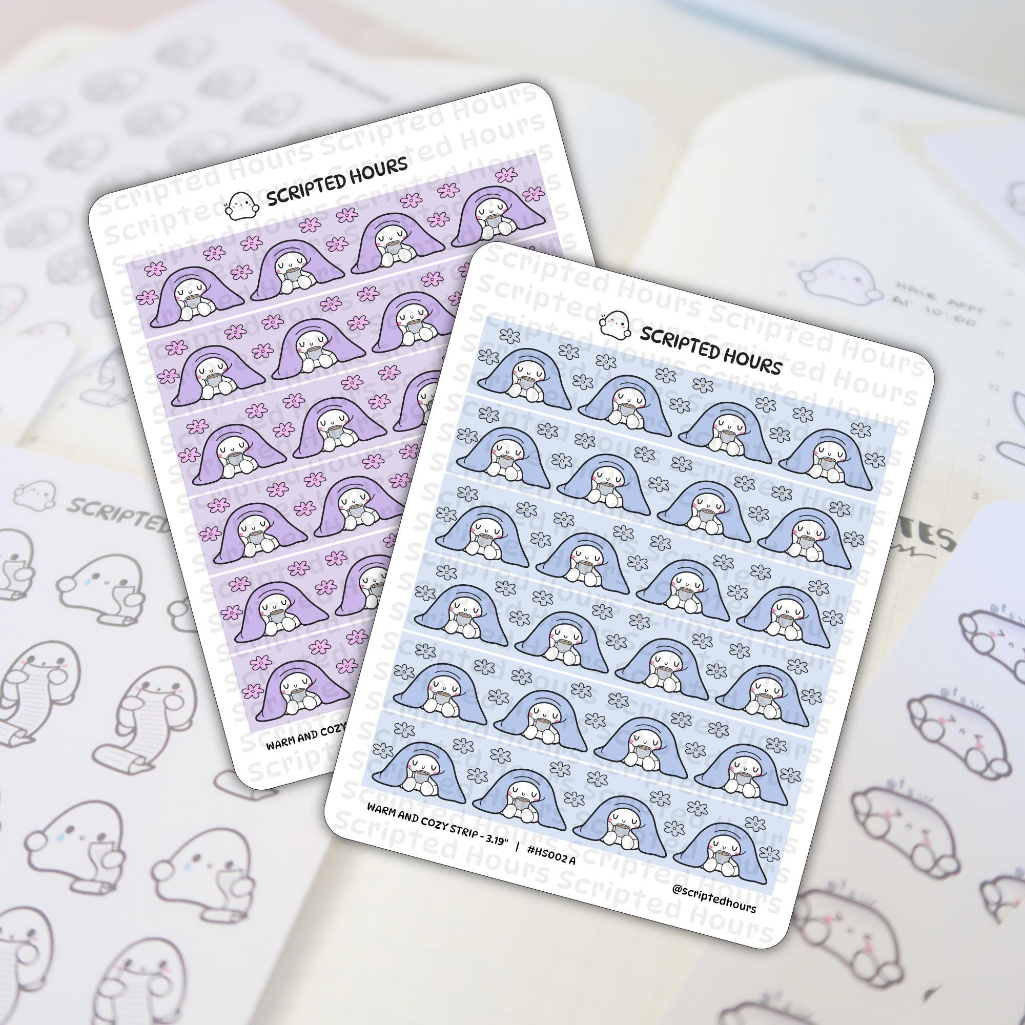 Sticker illustration by Scripted Hours featuring two 'Warm and Cozy' sticker sheets with white ghost characters holding mugs under purple blankets with pink flowers and blue blankets with blue flowers, displayed on a planner page next to outline ghost stickers
