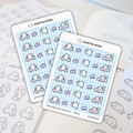 Scripted Hours sticker sheets of kawaii ghost characters enjoying retail therapy, featuring ghosts holding colorful pastel shopping bags like pink polka dot and purple with some exclaiming "Oops", displayed on a light blue striped background on a planner page